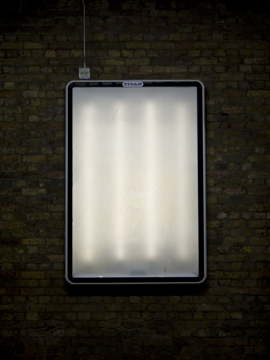 photograph showing blank back illuminated display board